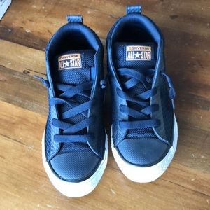 Youth size 4 converse shoes. New with tags. Never worn. Navy in color.
